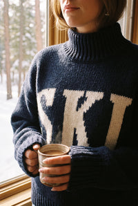 Navy SKI chunky knit sweater styled on Cape Cod for women 50+ – Susan & Anne