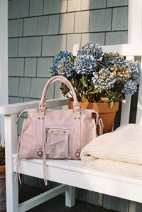 Pink suede studded shoulder bag styled on Cape Cod for women 50+ – Susan & Anne