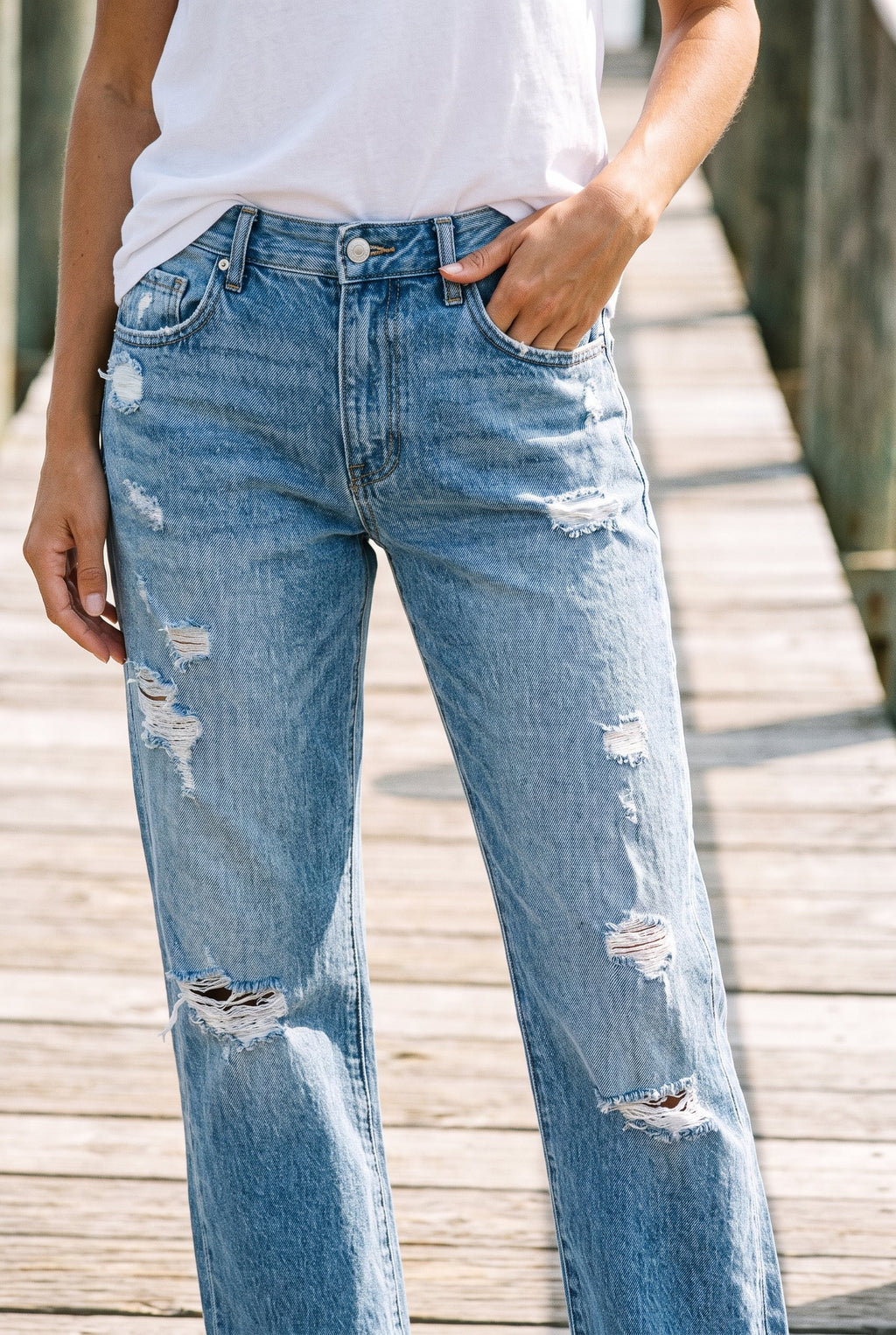 Relaxed distressed straight jeans styled on Cape Cod for women 50+ – Susan & Anne