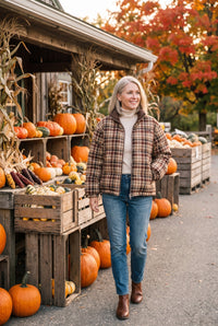 Reversible brown and plaid puffer jacket styled on Cape Cod for women 50+ – Susan & Anne