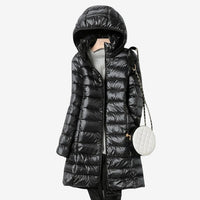 Close-up of the claudette hooded longline puffer coat