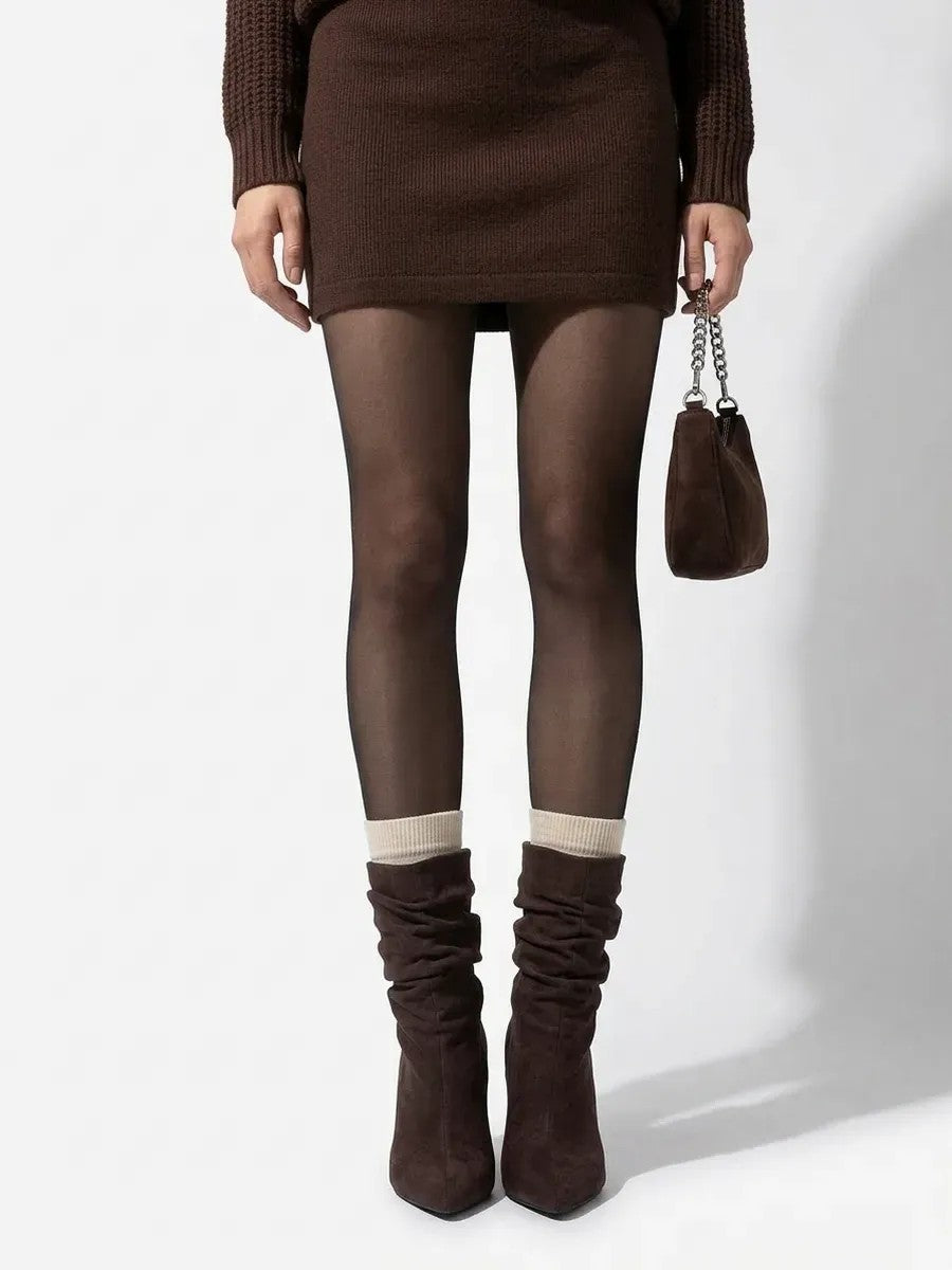 Woman wearing the slouchy faux suede stiletto ankle boots in brown