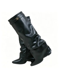 Woman wearing the slouchy fold-over lock faux leather knee-high boots in black